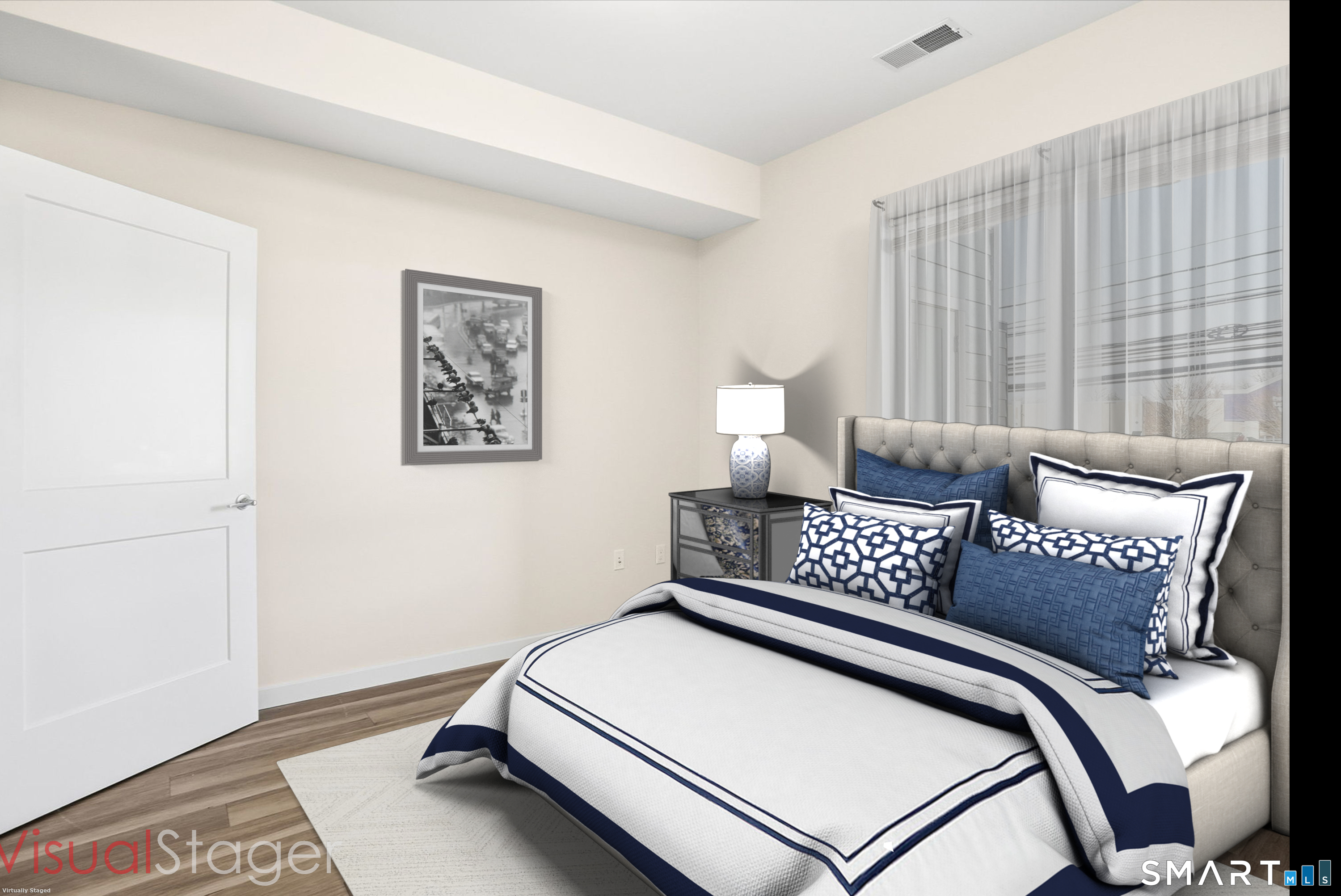 71 Connecticut Avenue, Unit 206 Norwalk, CT 06850 - Photo 14 of 17 a bedroom with a bed and a window