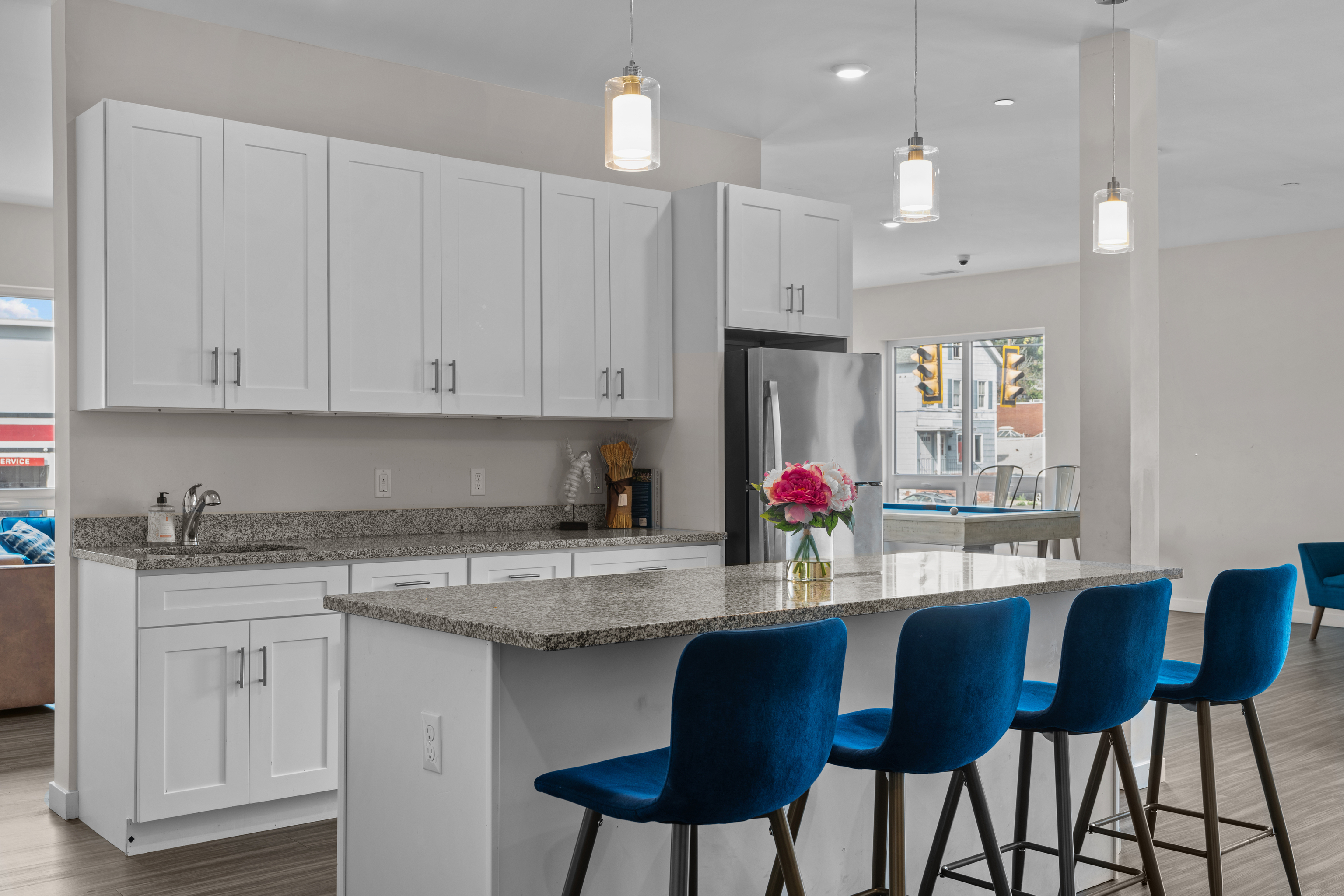 71 Connecticut Avenue, Unit 206 Norwalk, CT 06850 - Photo 2 of 17 a kitchen with stainless steel appliances granite countertop a white cabinets and a stove top oven