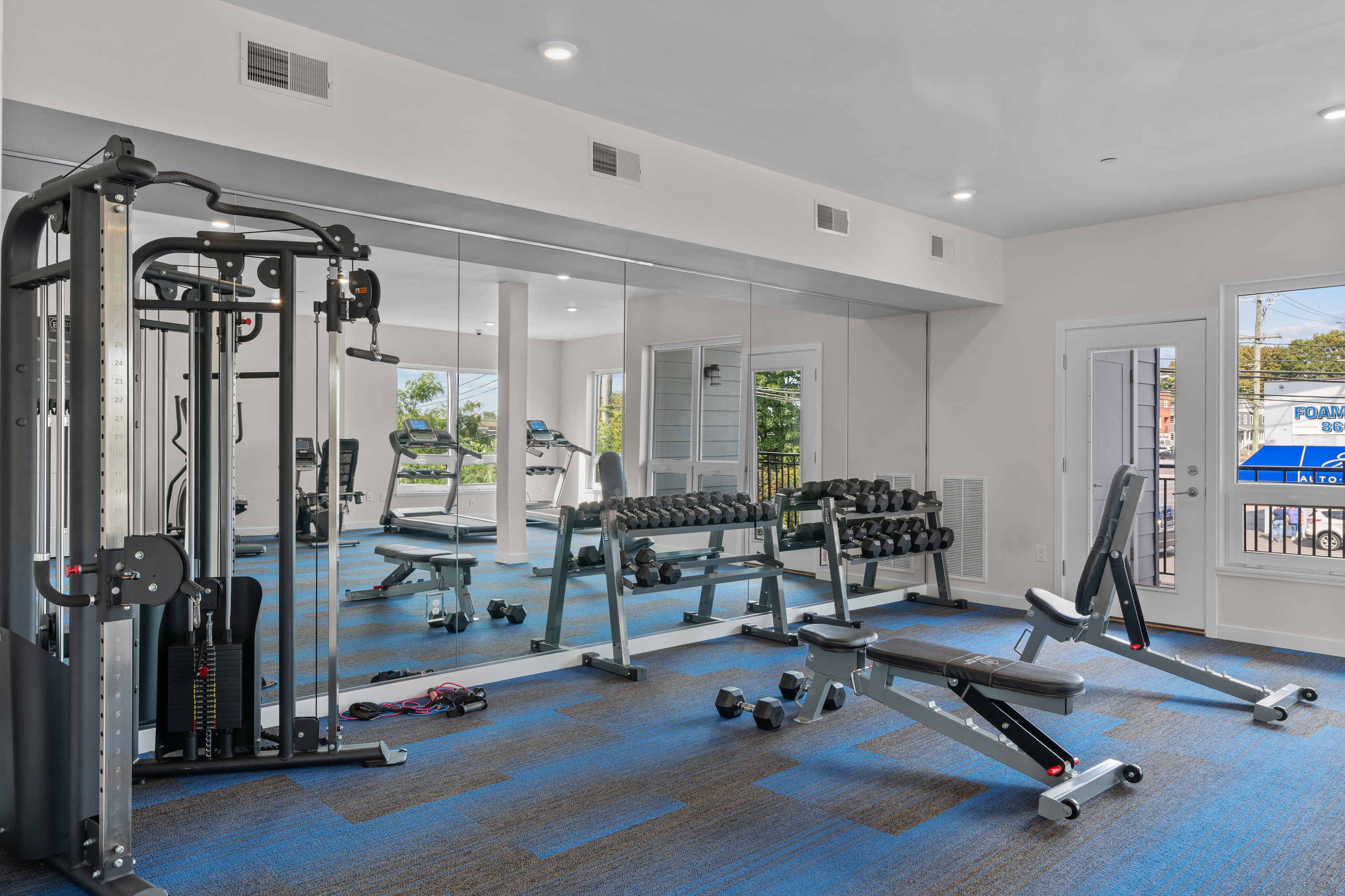 71 Connecticut Avenue, Unit 206 Norwalk, CT 06850 - Photo 6 of 17 a view of a room with gym equipment
