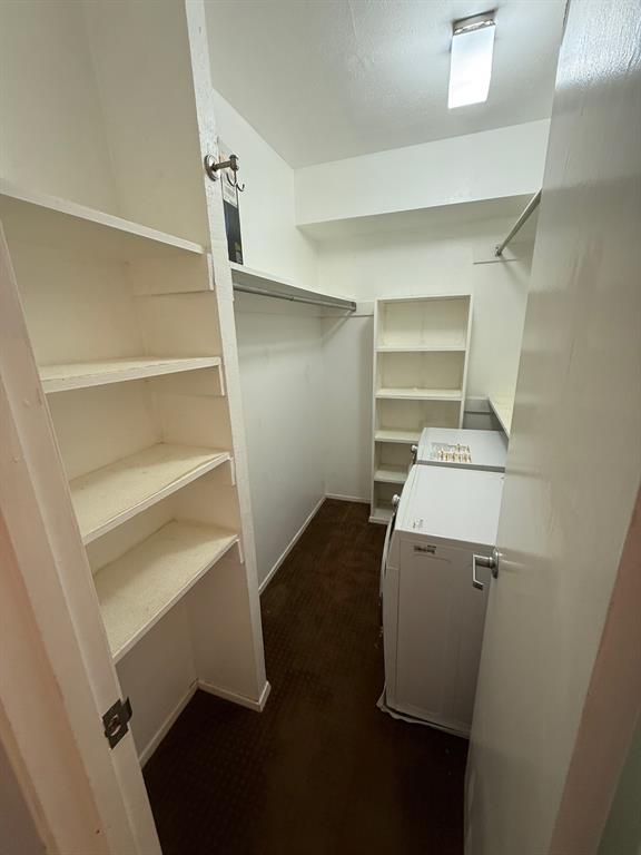 4845 Cedar Springs Road, Unit 368 Dallas, TX 75219 - Photo 22 of 38 a view of walk in closet with empty racks