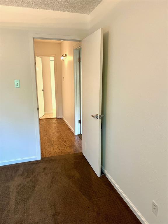 4845 Cedar Springs Road, Unit 368 Dallas, TX 75219 - Photo 27 of 38 an empty room with closet