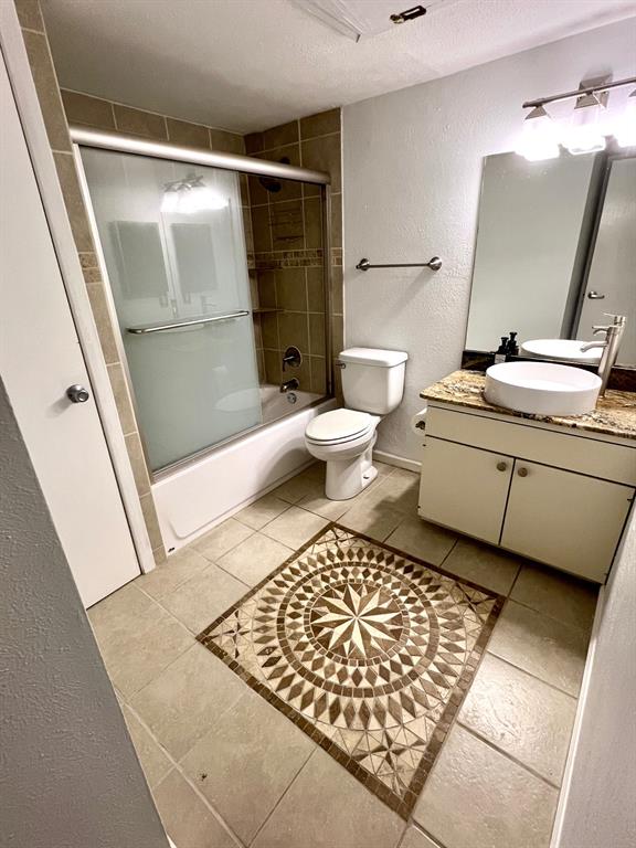 4845 Cedar Springs Road, Unit 368 Dallas, TX 75219 - Photo 28 of 38 a bathroom with a toilet and a shower