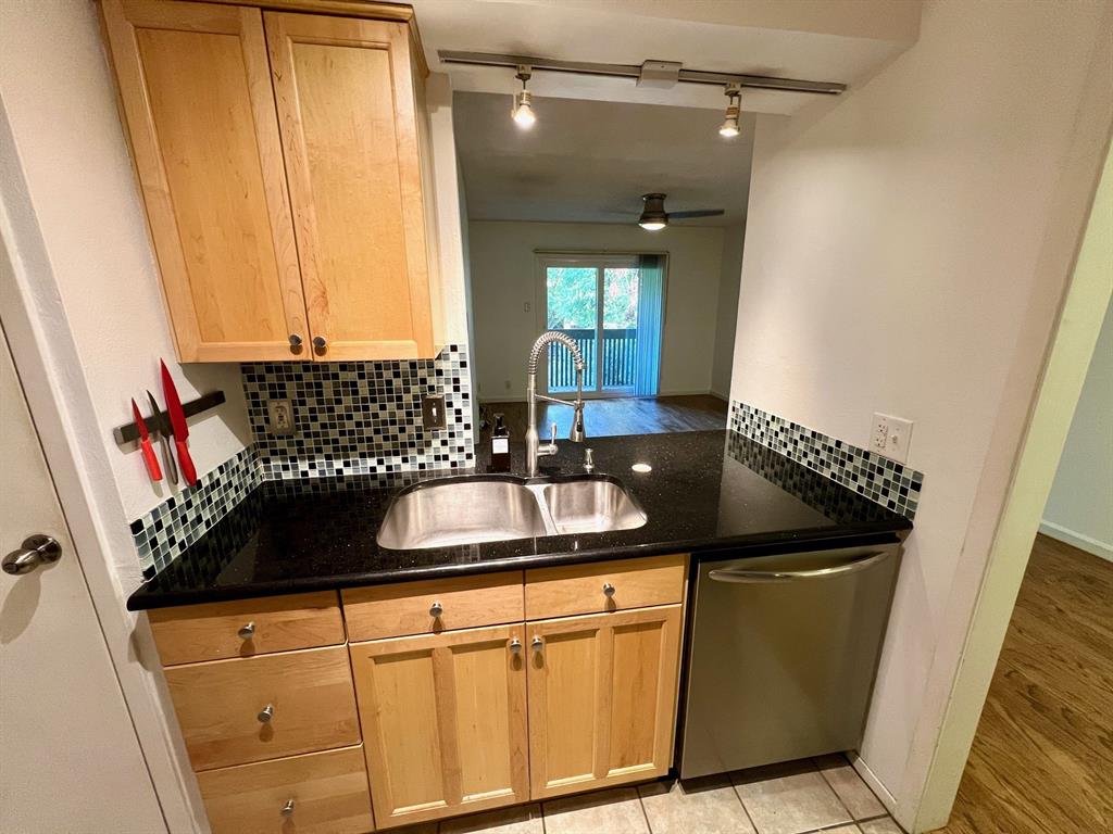 4845 Cedar Springs Road, Unit 368 Dallas, TX 75219 - Photo 3 of 38 a close view of a sink and a mirror