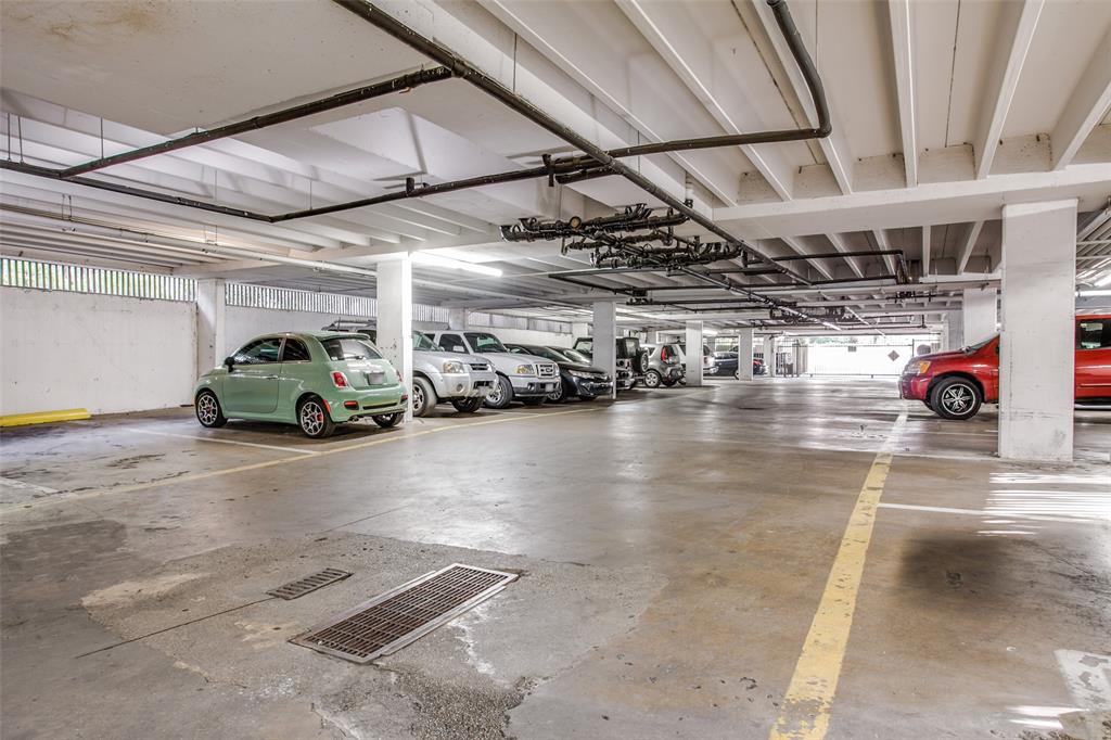 4845 Cedar Springs Road, Unit 368 Dallas, TX 75219 - Photo 36 of 38 a view of parking garage with cars