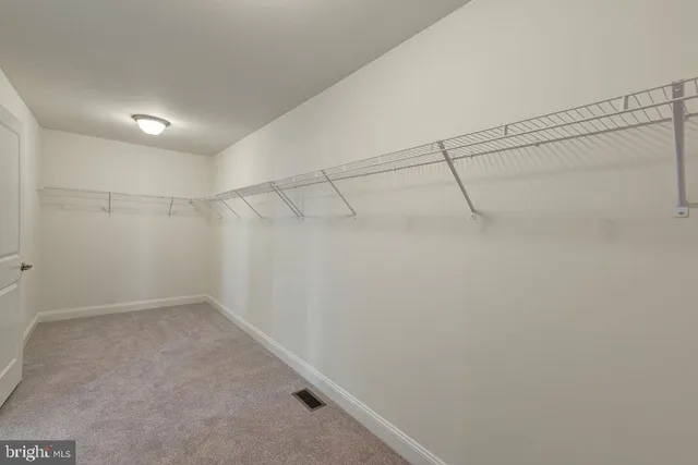 a view of a room with racks on the wall