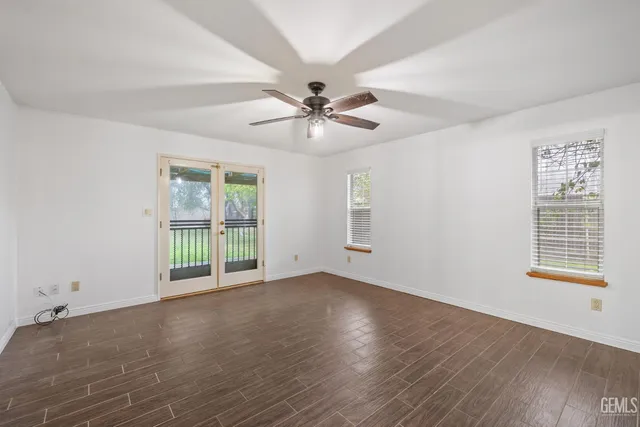 a bathroom with a double vanity sink and mirror