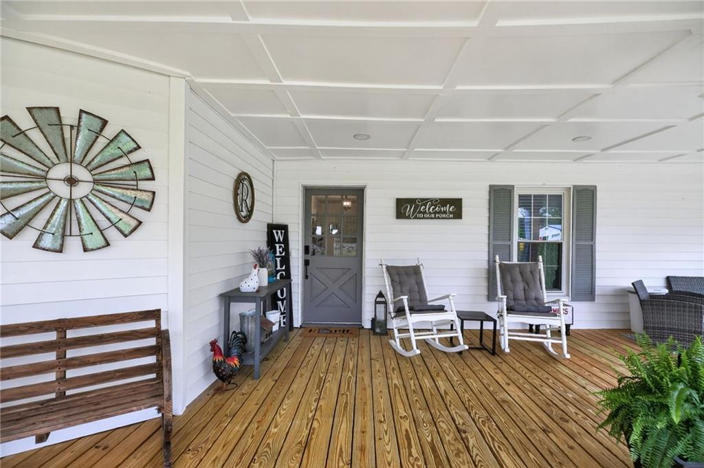 3590 Roosterville Road Roopville, GA 30170 - Photo 11 of 66 a living room with furniture and wooden floor