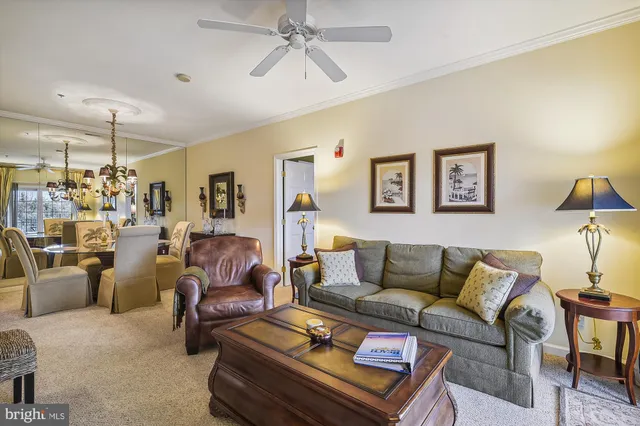 a bathroom with a sink vanity granite and toilet