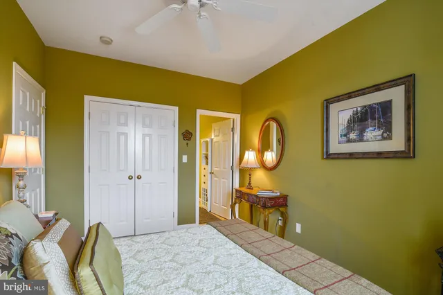 a bedroom with a bed and a cabinets