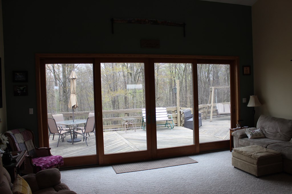 410 Line Road Knox, PA 16232 - Photo 7 of 42 a living room with furniture and a floor to ceiling window
