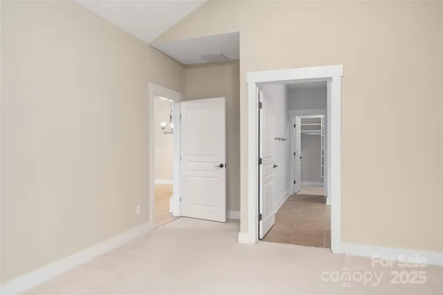 a view of a room with a hallway