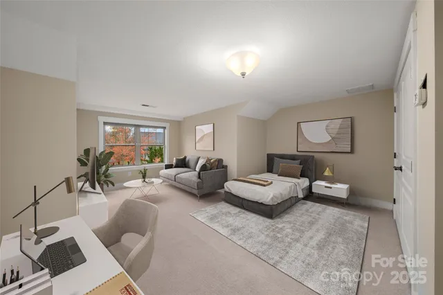 a living room with furniture and a lamp