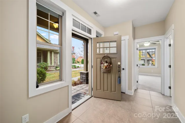 a view of a entryway door front of a house