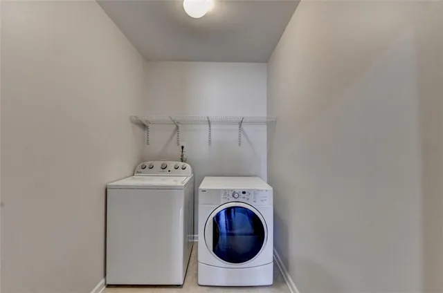 a view of balcony with furniture and wooden floor