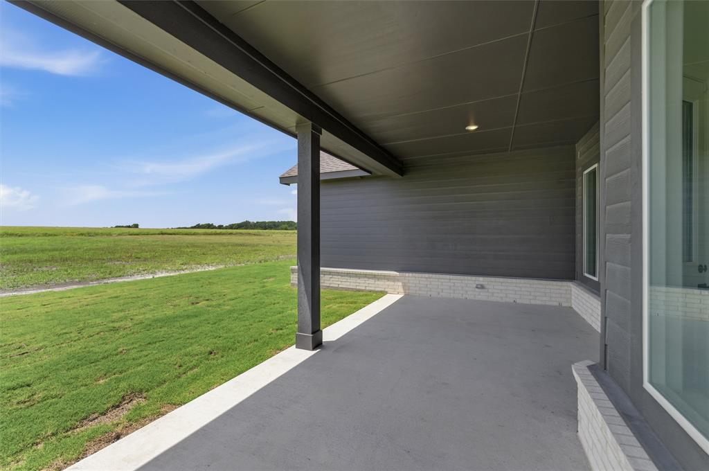 8861 County Road 623 Blue Ridge, TX 75424 - Photo 20 of 25 Covered patio with recessed lighting, featuring gray siding and light brick accents