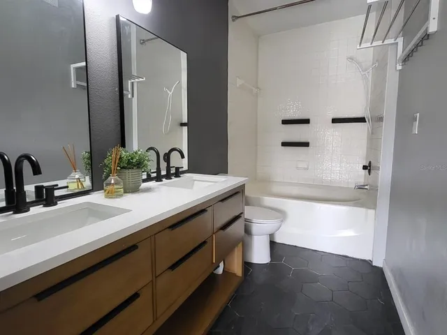 a view of a glass door and the balcony