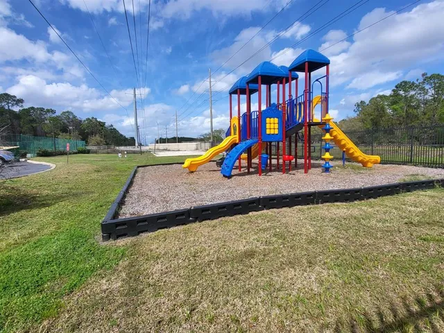 a front view of a house with a yard outdoor seating and entertaining space