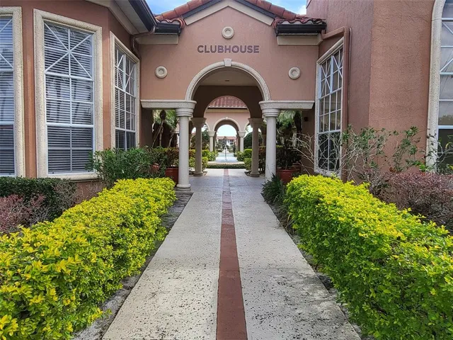 a view of a house with fountain