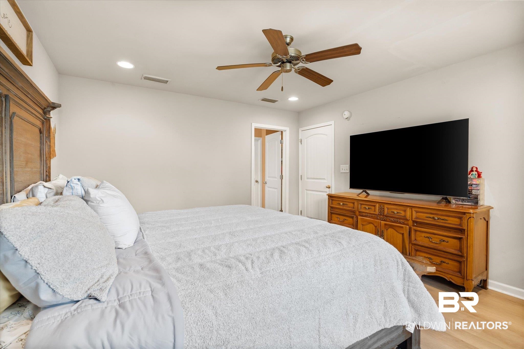 2855 Rebecca Drive West Mobile, AL 36618 - Photo 11 of 22 Bedroom featuring light hardwood / wood-style flooring and ceiling fan