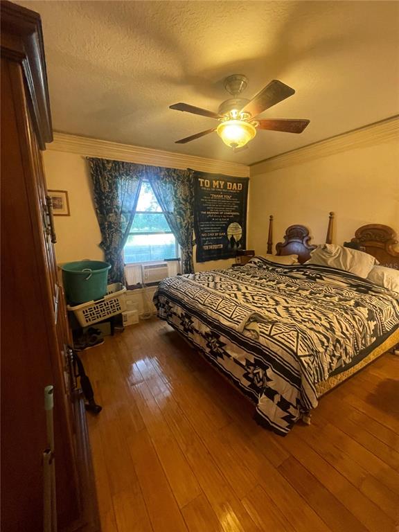396 Kettering Road Deltona, FL 32725 - Photo 21 of 25 a bed sitting in a bedroom next to a window