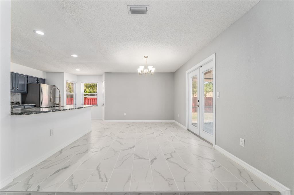 5041 Northeast 4th Street Ocala, FL 34470 - Photo 17 of 70 a view of an empty room and a window