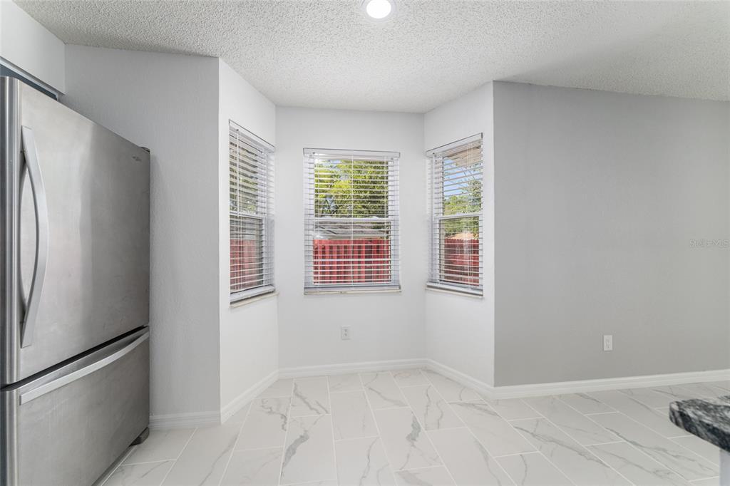 5041 Northeast 4th Street Ocala, FL 34470 - Photo 29 of 70 a view of an empty room with a window