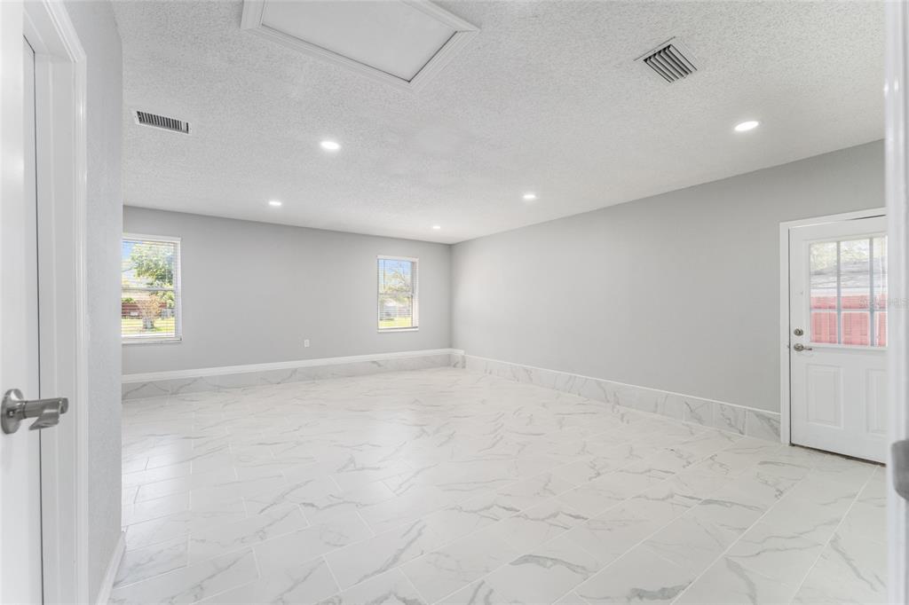 5041 Northeast 4th Street Ocala, FL 34470 - Photo 30 of 70 an empty room with windows and closet