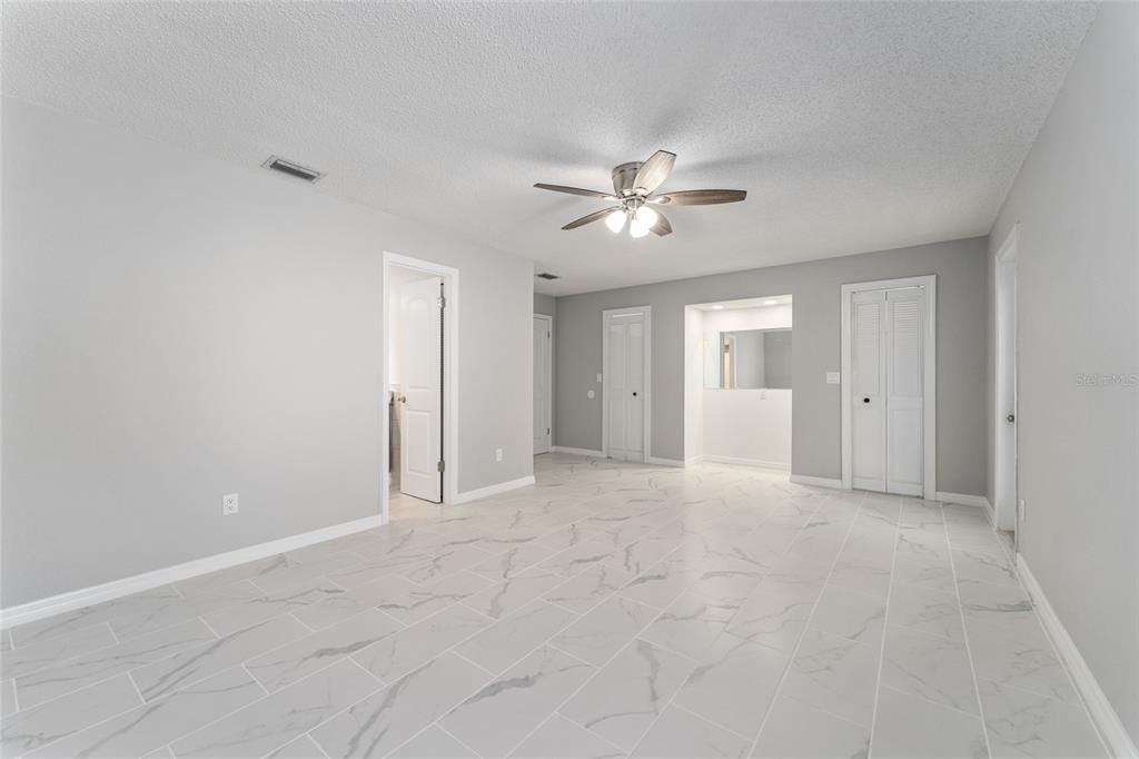 5041 Northeast 4th Street Ocala, FL 34470 - Photo 36 of 70 a view of an empty room with a bathroom