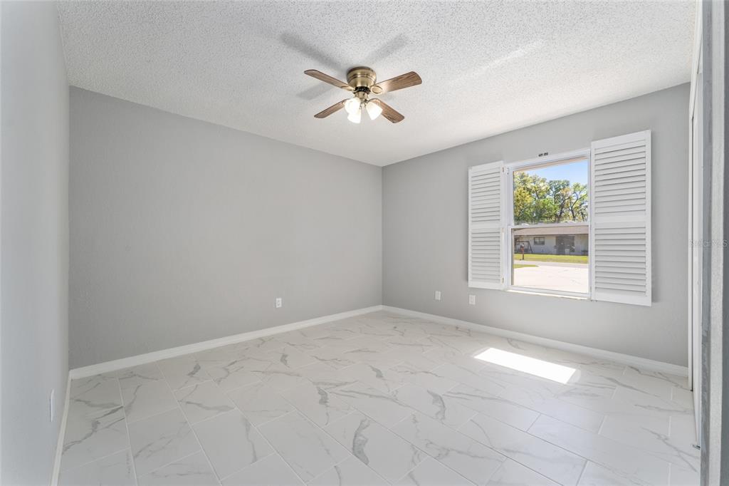 5041 Northeast 4th Street Ocala, FL 34470 - Photo 44 of 70 a view of an empty room with a window