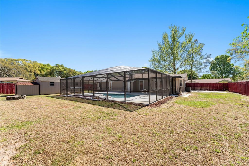 5041 Northeast 4th Street Ocala, FL 34470 - Photo 58 of 70 a view of a yard with a large tree