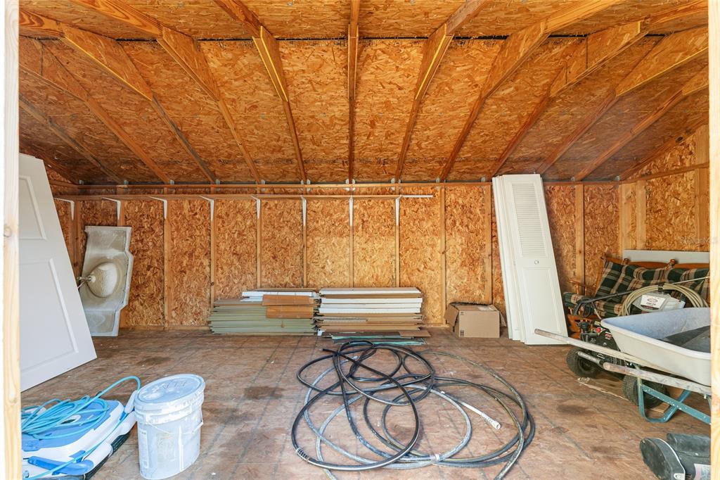 5041 Northeast 4th Street Ocala, FL 34470 - Photo 65 of 70 a dining room with furniture and a floor to ceiling window