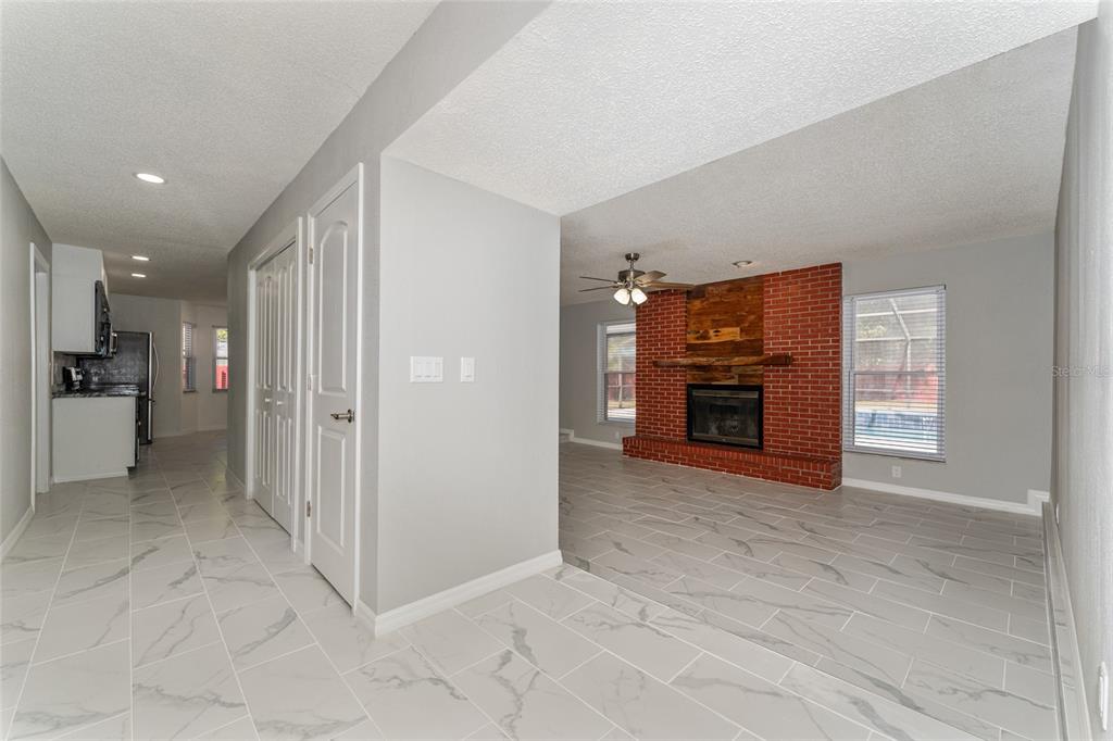5041 Northeast 4th Street Ocala, FL 34470 - Photo 9 of 70 a view of a livingroom with a fireplace
