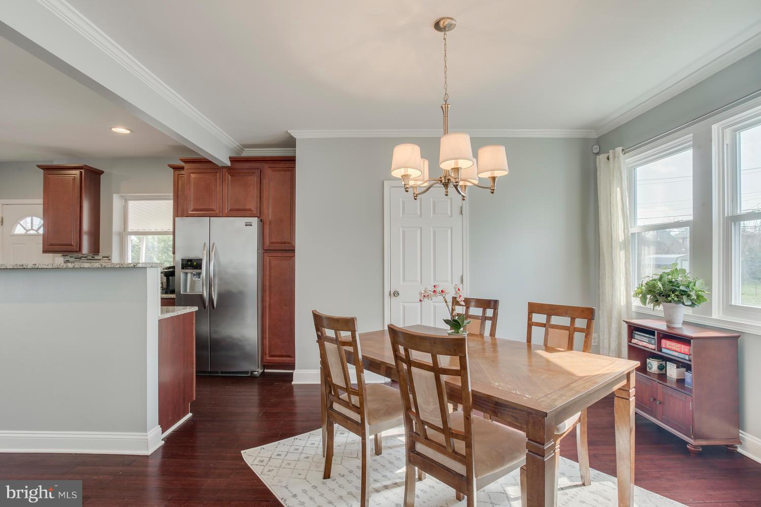 2403 East Cold Spring Lane Baltimore, MD 21214 - Photo 13 of 29 Kitchen/Dining area with adjacent half bath
