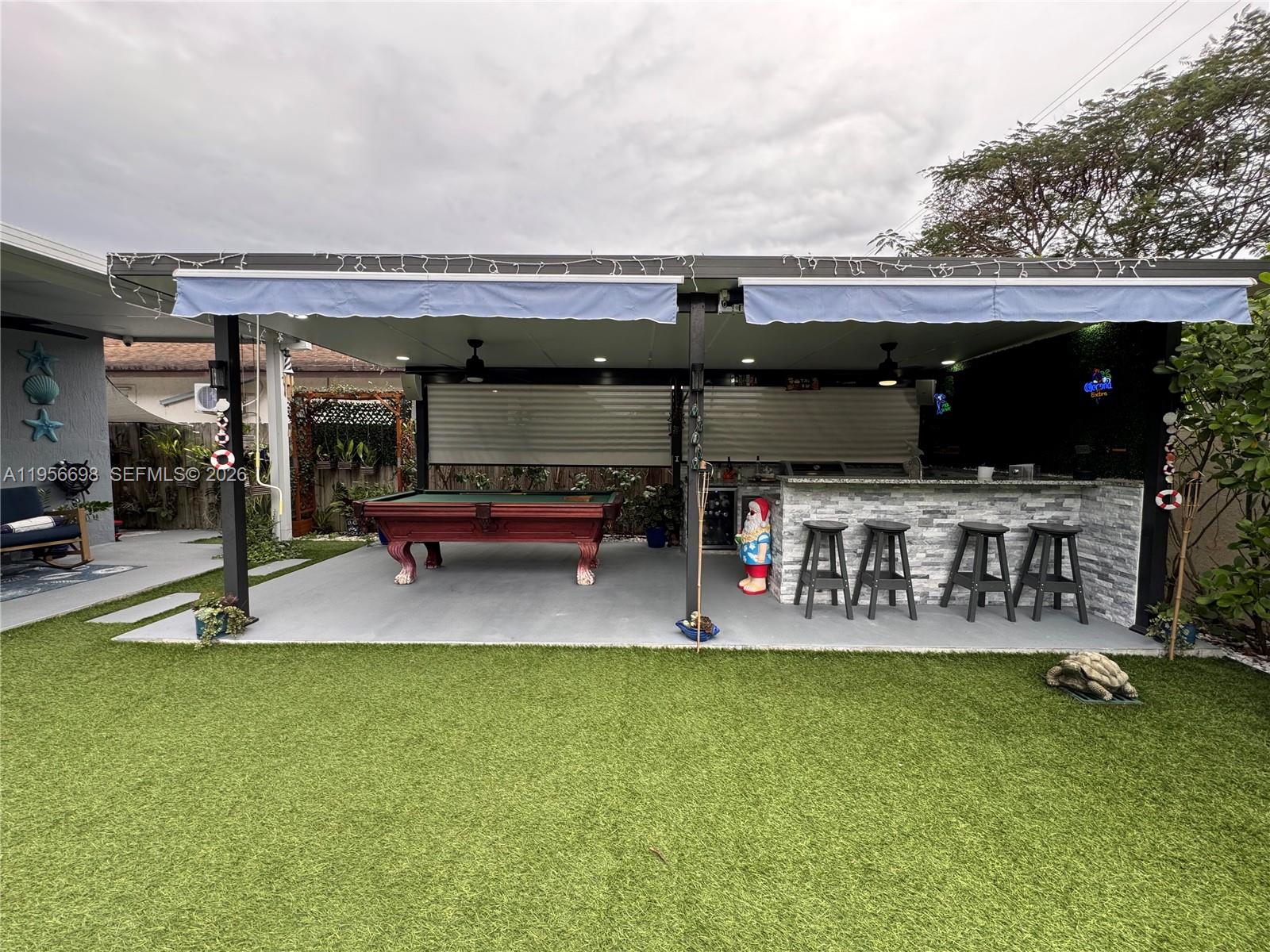 885 Northeast 3rd Avenue Homestead, FL 33030 - Photo 26 of 36 Pergola- kitchen bar