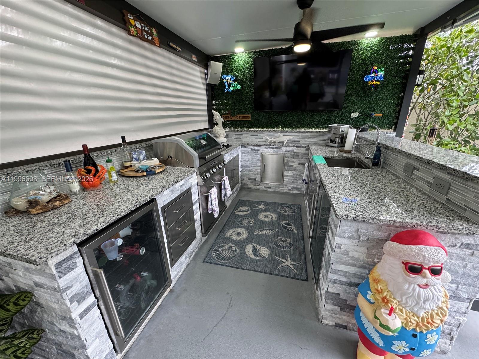 885 Northeast 3rd Avenue Homestead, FL 33030 - Photo 28 of 36 Pergola- kitchen bar