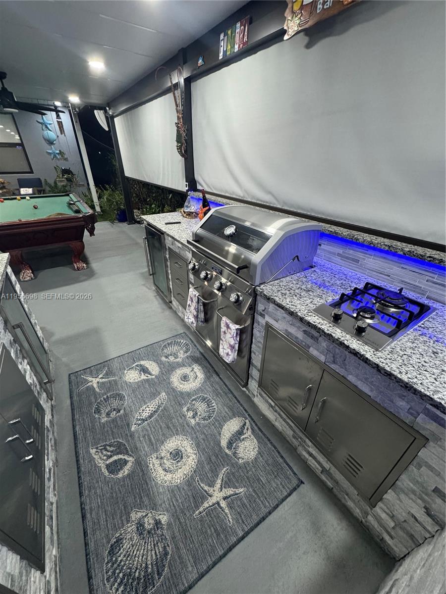 885 Northeast 3rd Avenue Homestead, FL 33030 - Photo 29 of 36 Pergola- kitchen bar