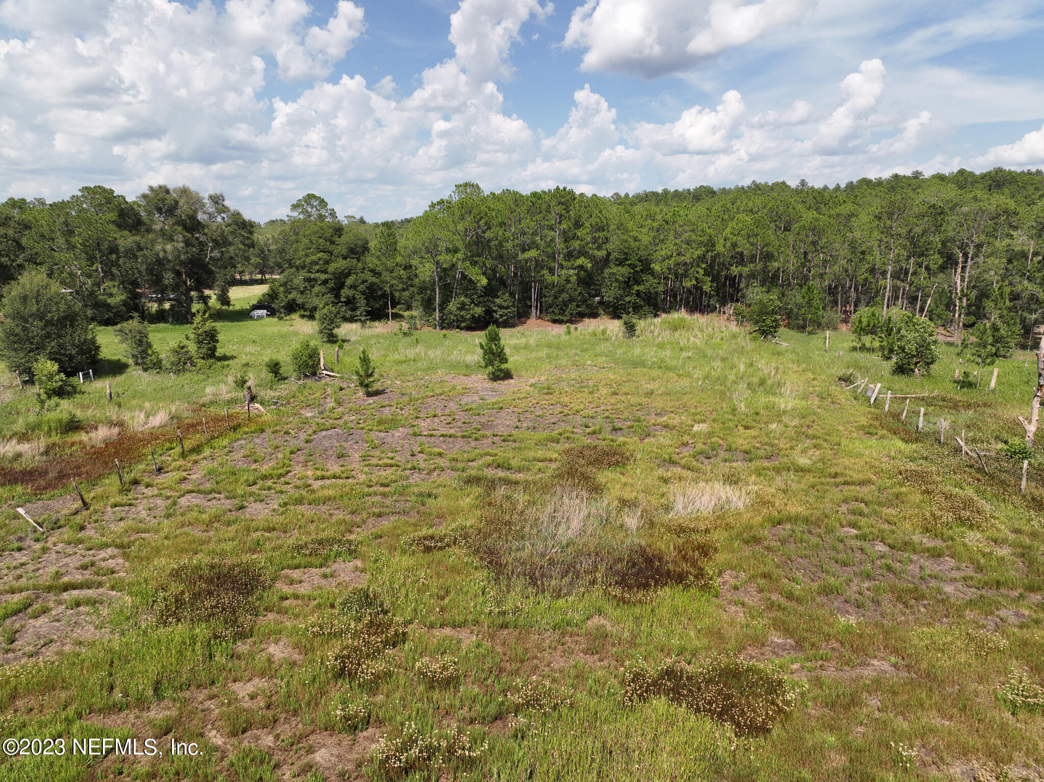 8146 Blazing Star Road Melrose, FL 32666 - Photo 16 of 19 a view of a lake with houses