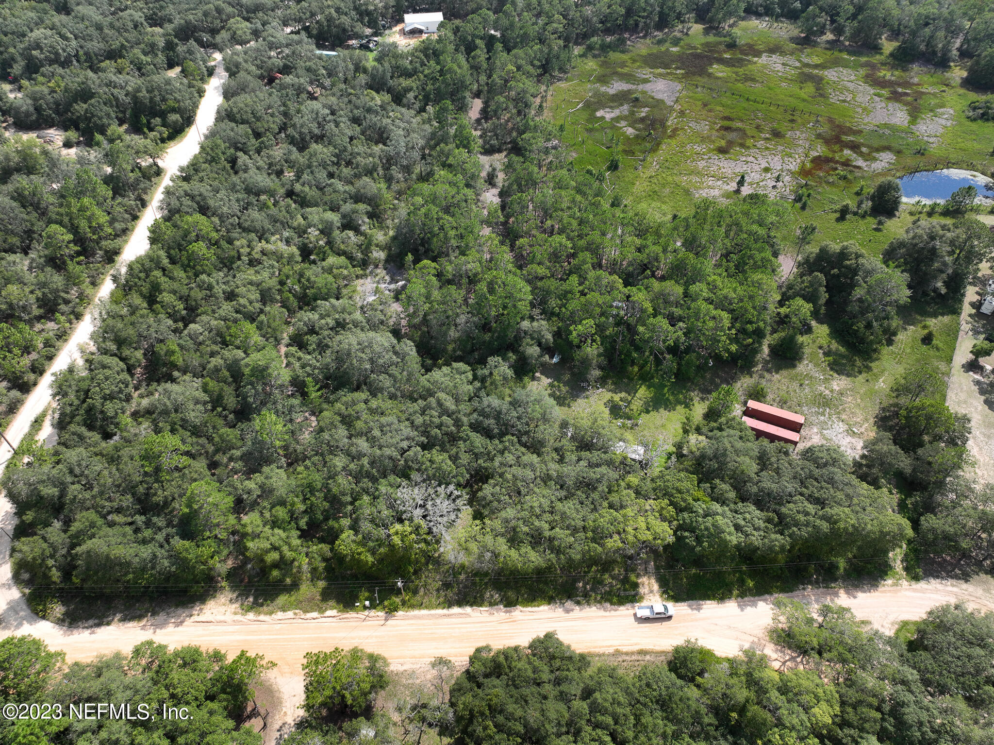 8146 Blazing Star Road Melrose, FL 32666 - Photo 19 of 19 a view of a house with a yard