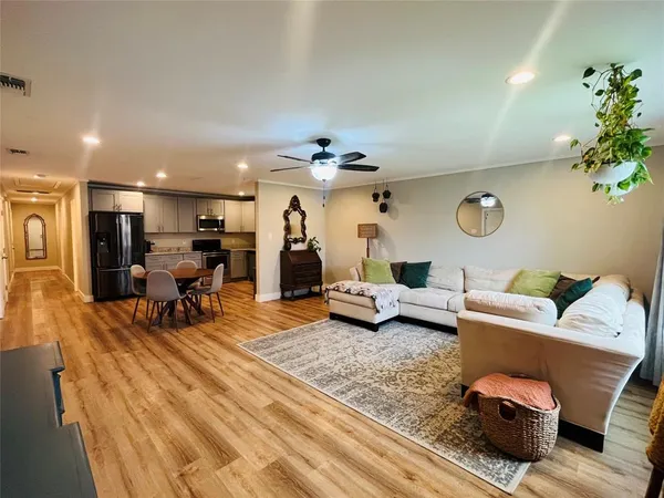 a living room with furniture and a table