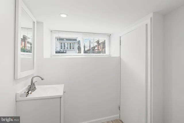 a view of a bathroom with a toilet