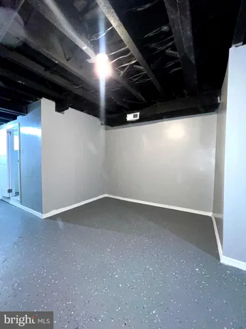 a front view of a house with a iron gate