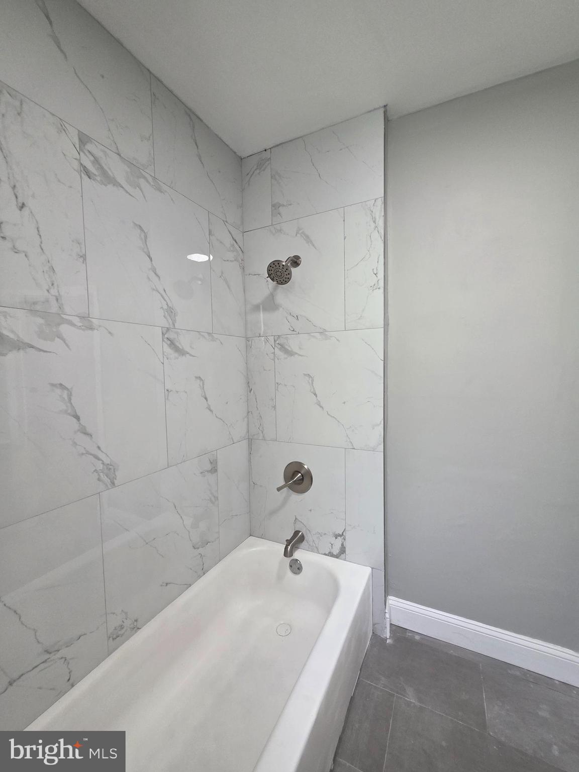 6026 Irving Street Philadelphia, PA 19139 - Photo 23 of 30 a bathroom with a sink and a shower