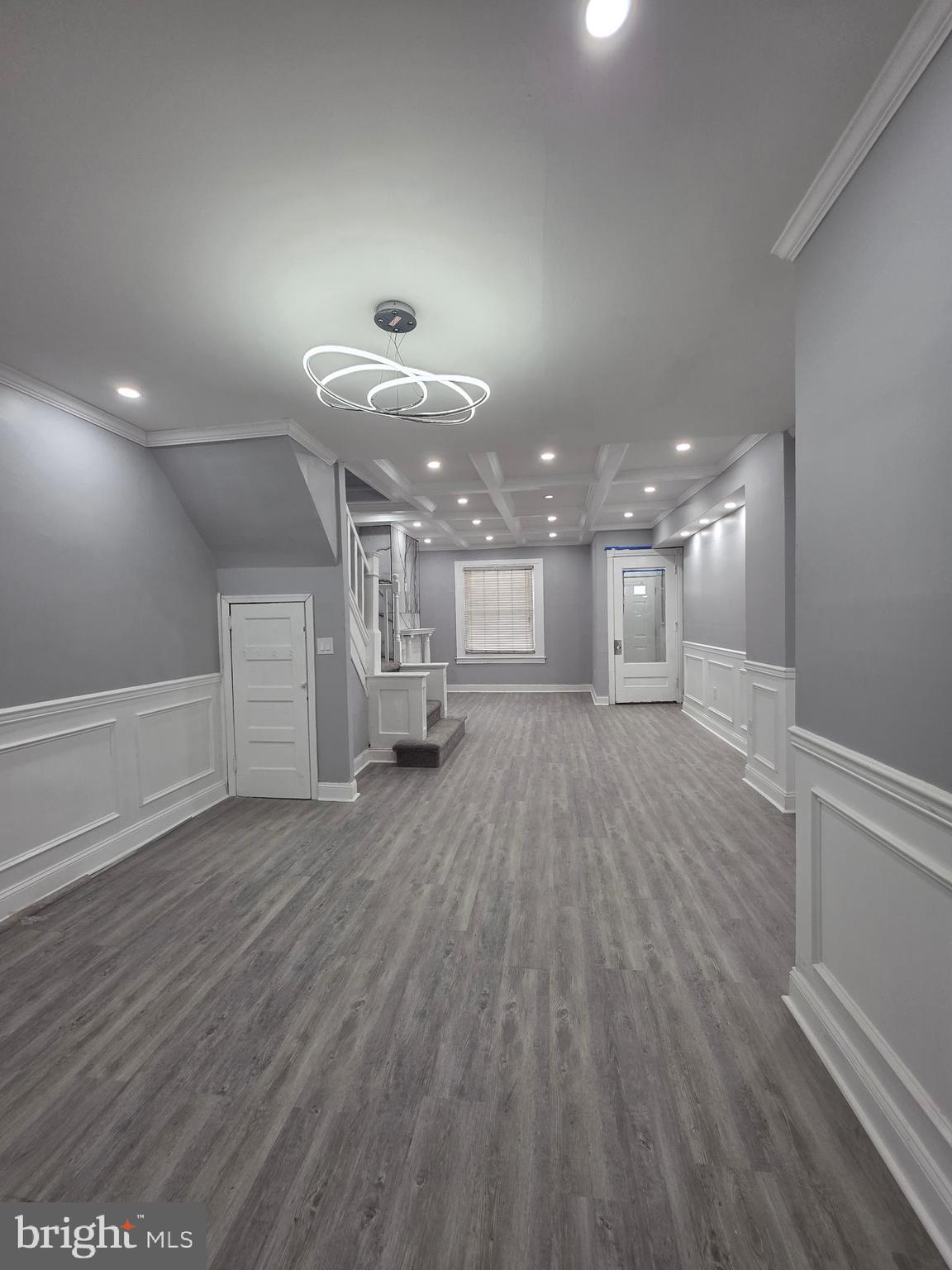 6026 Irving Street Philadelphia, PA 19139 - Photo 6 of 30 a view of a room with wooden floor and window