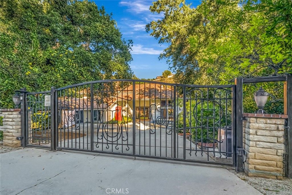 a view of a balcony with a iron gate