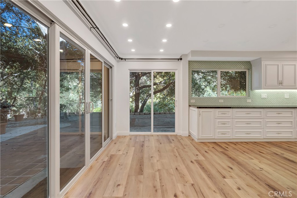 119 Bell Cyn Road Bell Canyon, CA 91307 - Photo 5 of 18 a view of a porch with wooden floor and front door