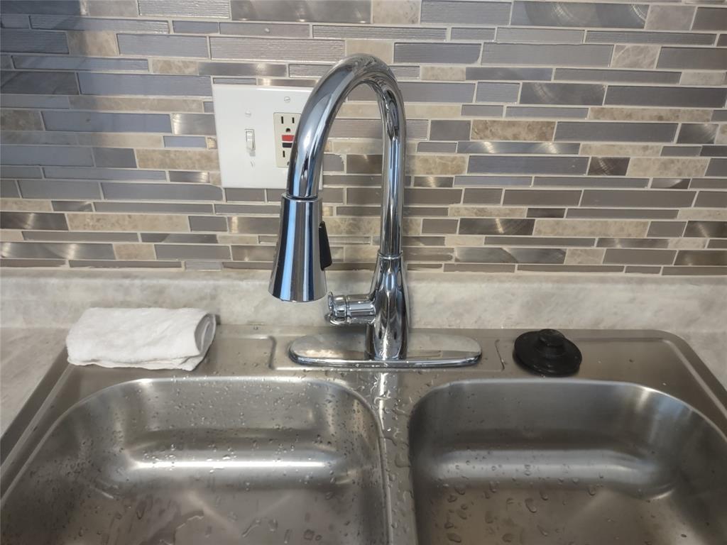 128 Miami Gardens Road West Park, FL 33023 - Photo 12 of 38 a close view of sink