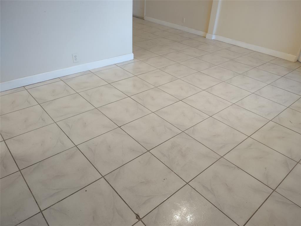 128 Miami Gardens Road West Park, FL 33023 - Photo 22 of 38 a view of a garage and white wall