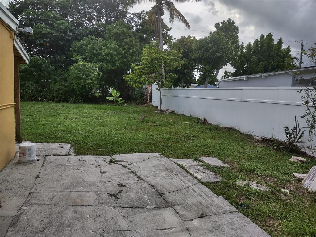 128 Miami Gardens Road West Park, FL 33023 - Photo 33 of 38 a view of a backyard