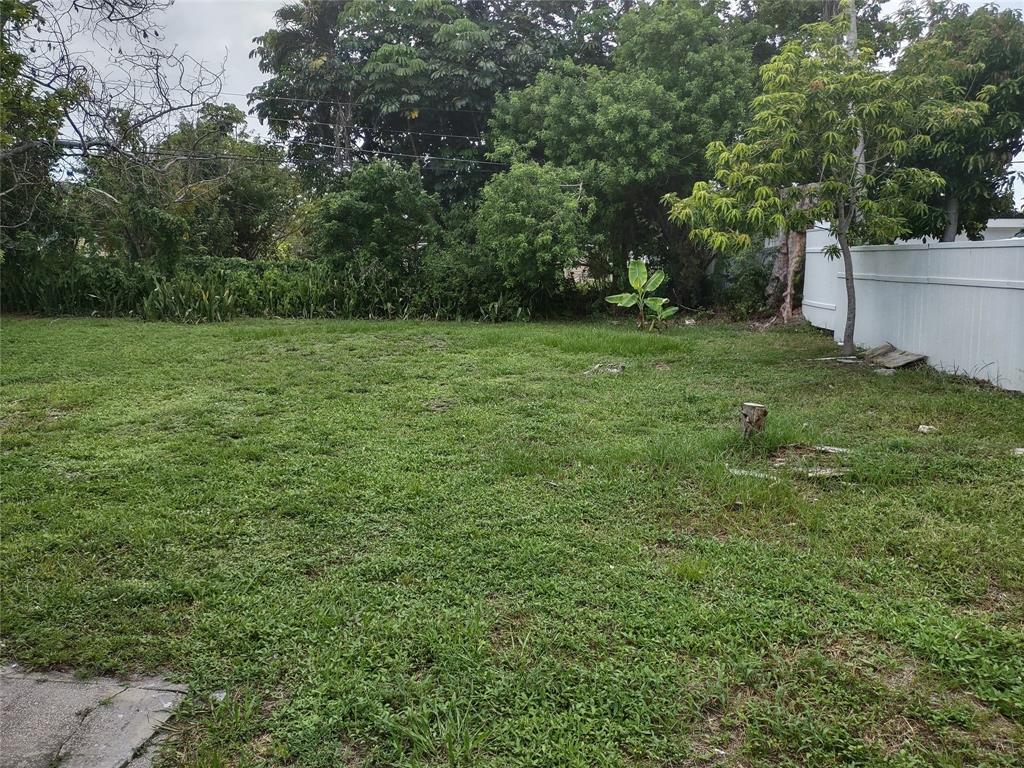 128 Miami Gardens Road West Park, FL 33023 - Photo 35 of 38 a view of a backyard