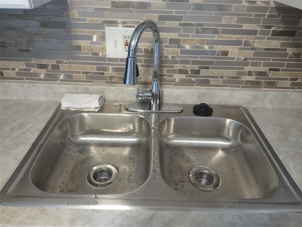 128 Miami Gardens Road West Park, FL 33023 - Photo 10 of 38 a close view of sink